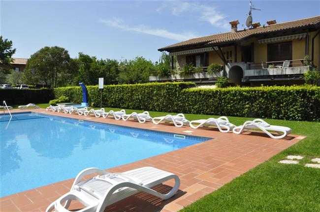 Pool with shared deck chairs