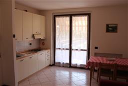 Living room with kitchen